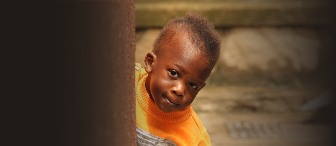 Child in orange sweter 10